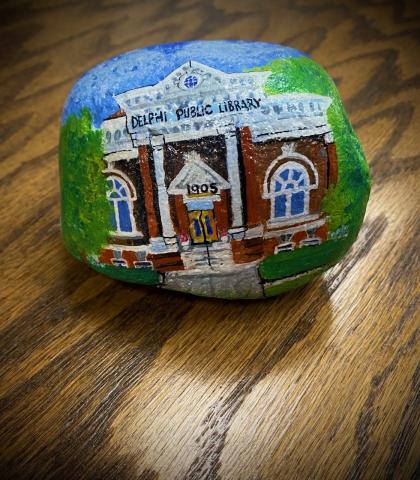 Delphi Public Library painted on a rock