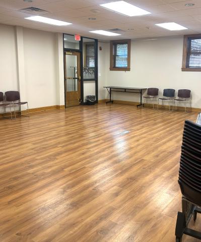 Image of the Gerber Globe Valve Program Room. Room has vinyl plank flooring and movable tables and chairs.